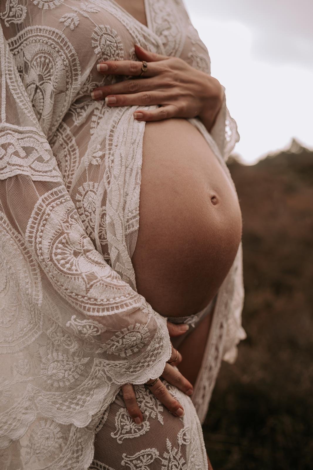 Hands holding baby feet